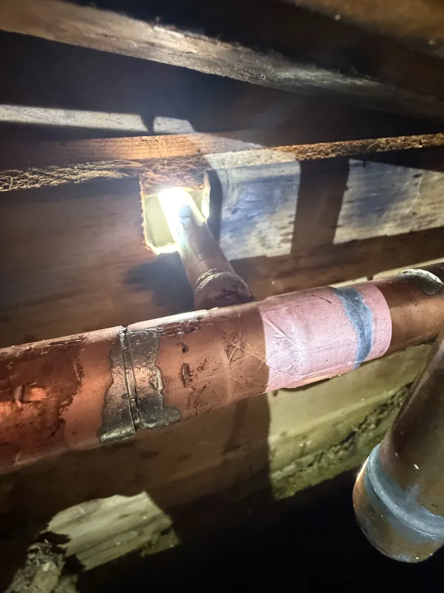 Copper repair — under the house
