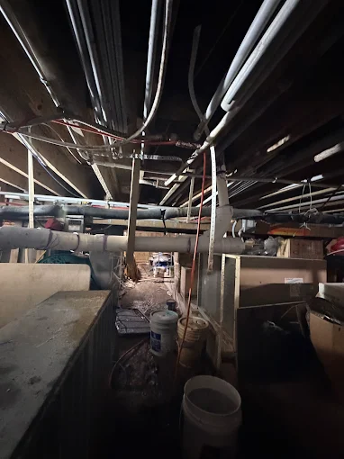 Pier & beam plumbing — under the building
